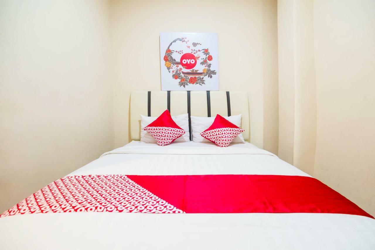 Sentosa Guest House Pontianak Kültér fotó