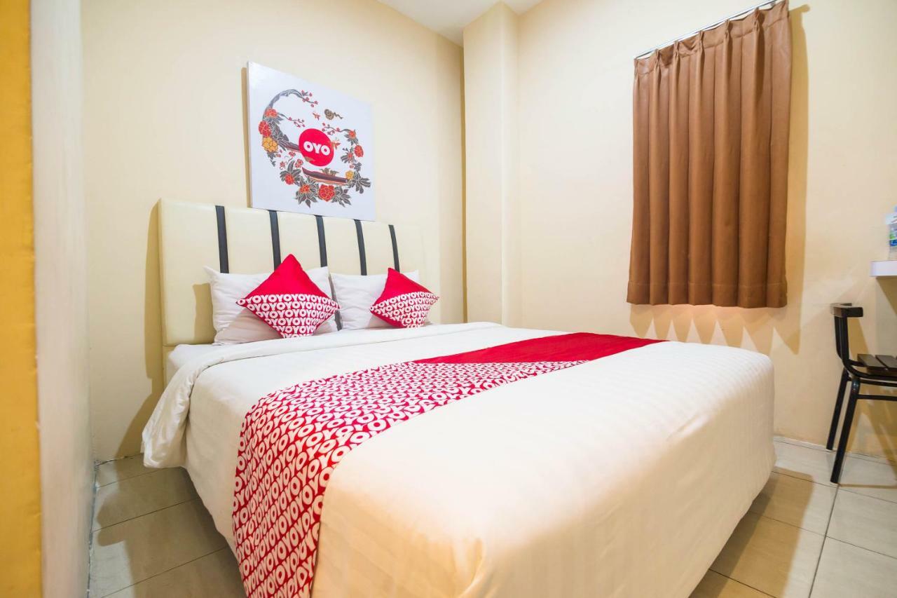 Sentosa Guest House Pontianak Kültér fotó